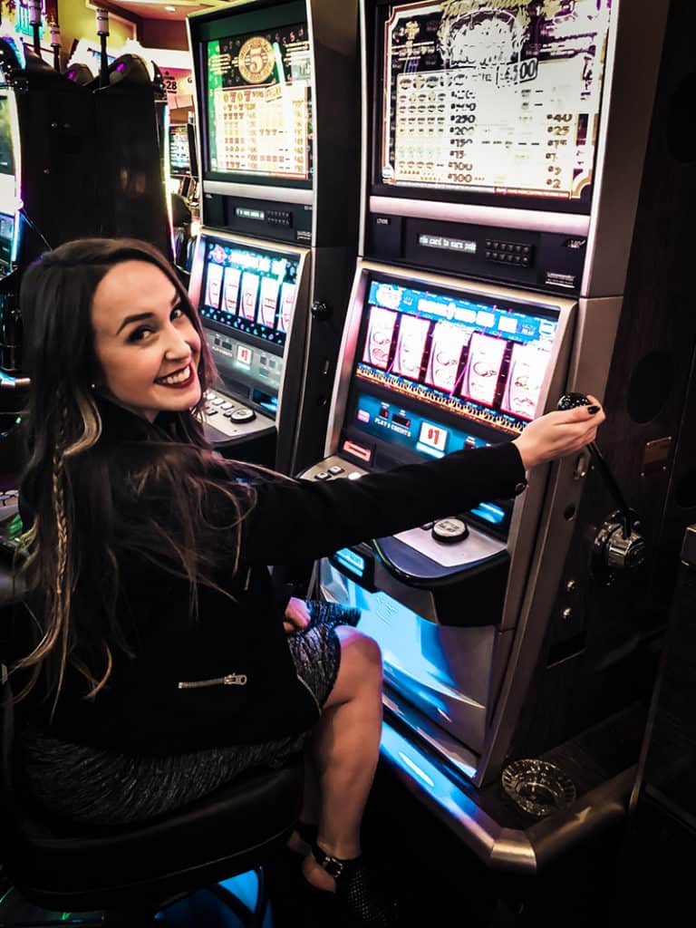 Girl Gambling on Slot Machine