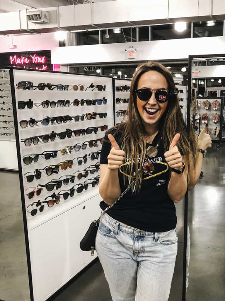 Girl shopping for sunglasses