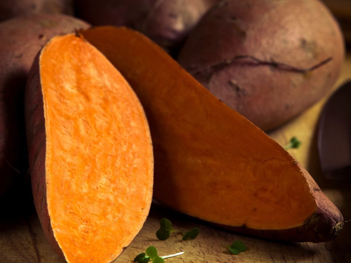 A sweet potato cut open and shot up close.